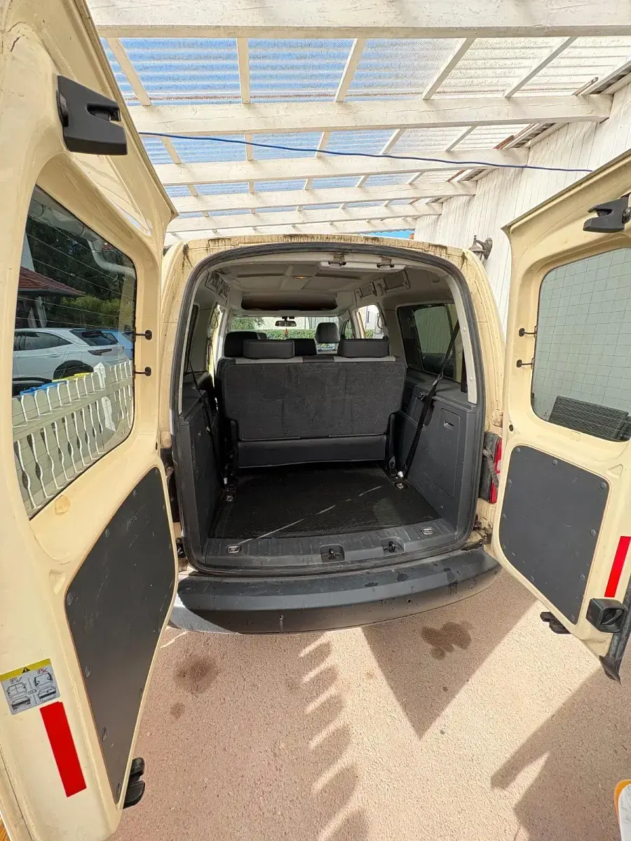 Używany VW Caddy Maxi 102 KM (75 kW) 2014 Żółty Minivan