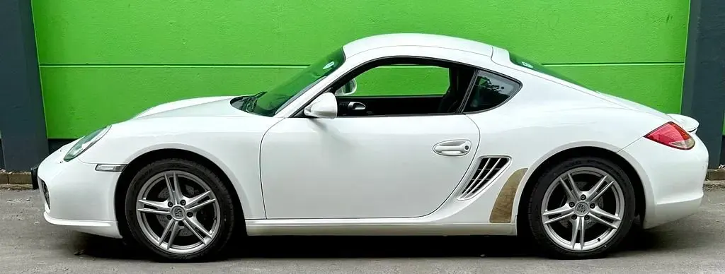 Gebraucht Porsche Cayman 265 PS (194 kW) 2009 Weiß Coupé