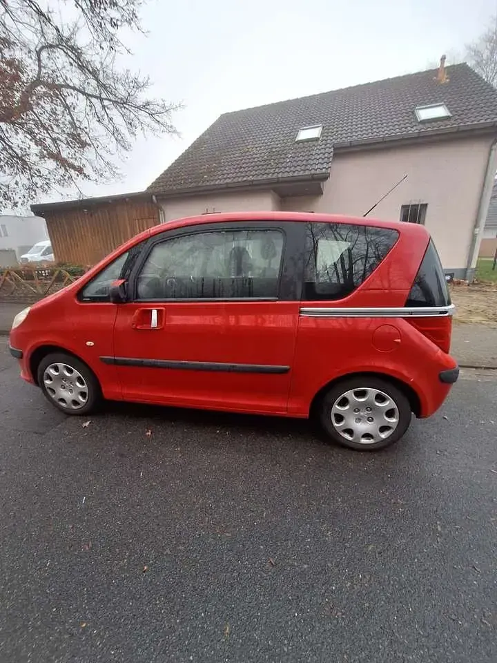 Gebraucht Peugeot 1007 Premium 73 PS (53 kW) 2006 Rot Van / Kleinbus
