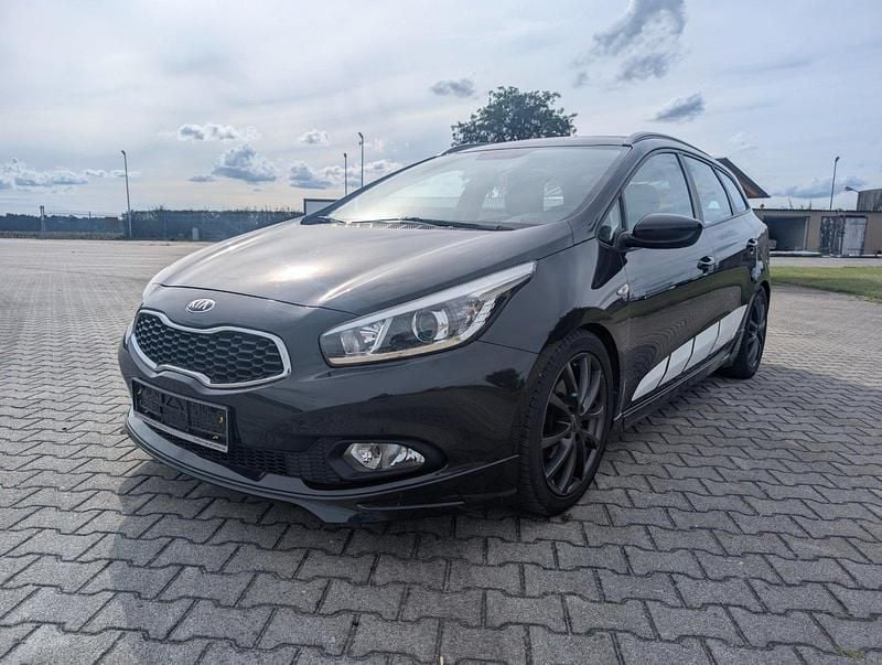 Schwarz Gebraucht 2014 Kia Ceed 2 Kombi | 6.999 € (Guter Preis) - Bild 1/4