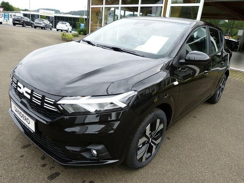 Perlmuttschwarz metallic Gebraucht 2024 Dacia Sandero Journey Kleinwagen | 18.599 € (Fairer Preis) - Bild 1/4