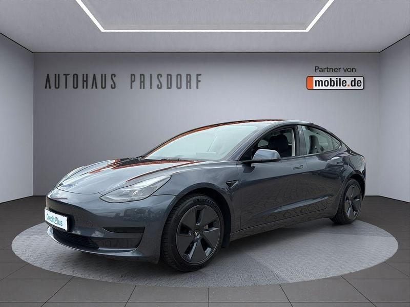Stealth grey Gebraucht 2021 Tesla Model 3 Standard Range Limousine | 24.450 € (Fairer Preis) - Bild 1/4