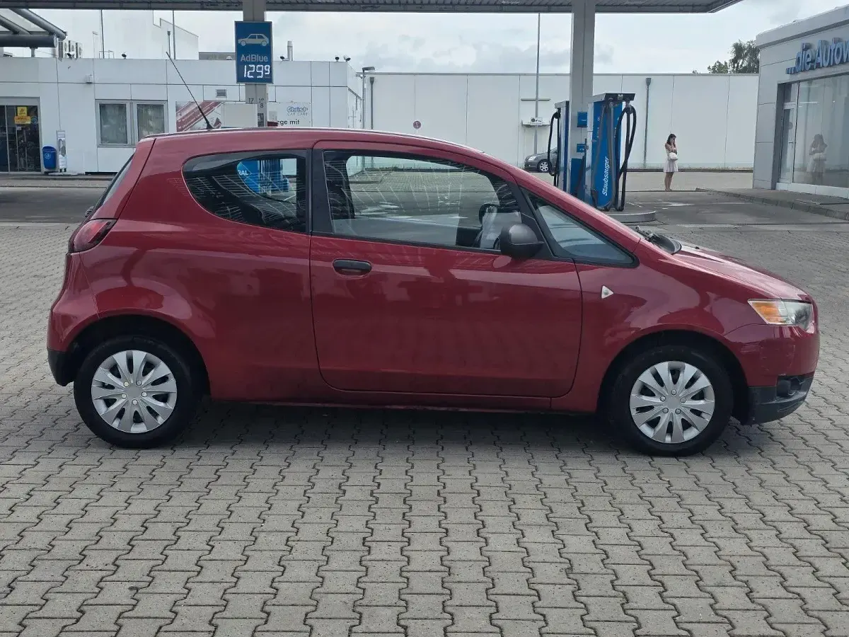 Gebraucht Mitsubishi Colt Inform 75 PS (55 kW) 2009 Rot Kleinwagen