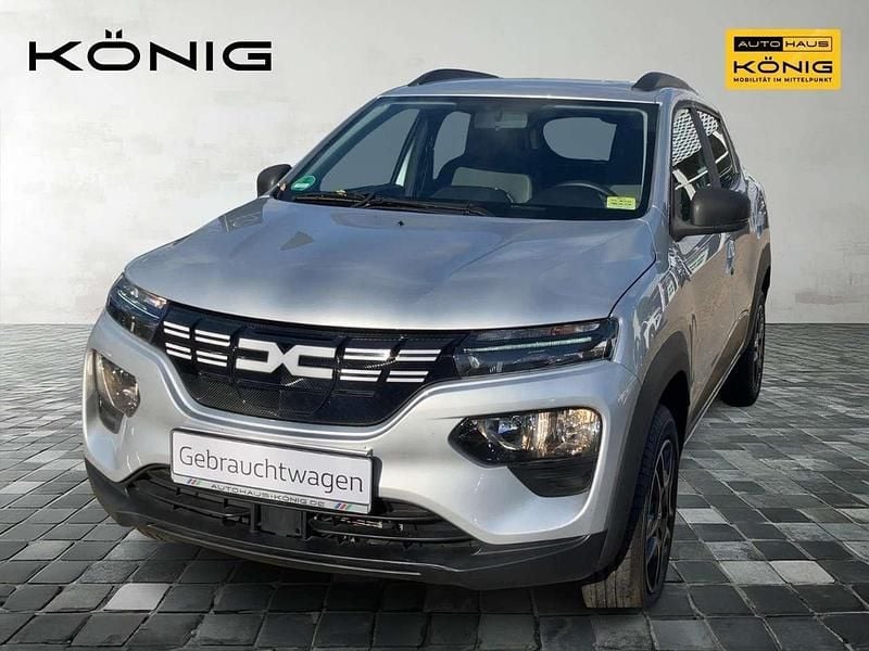 Diamantsilbergrau Gebraucht 2023 Dacia Spring Essentiel Kleinwagen | 13.998 € (Fairer Preis) - Bild 1/4