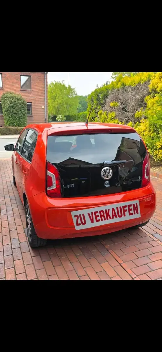 Używany VW up! 75 KM (55 kW) 2014 Pomarańczowy Hatchback