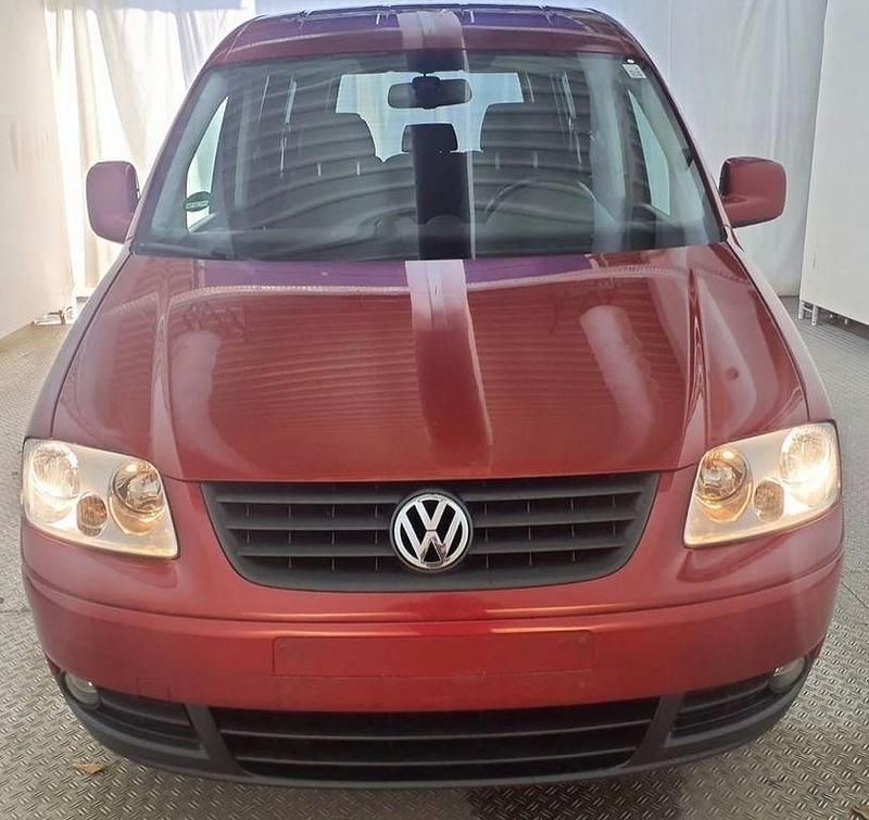 Gebraucht VW Caddy Team 105 PS (77 kW) 2010 Rot Van / Kleinbus