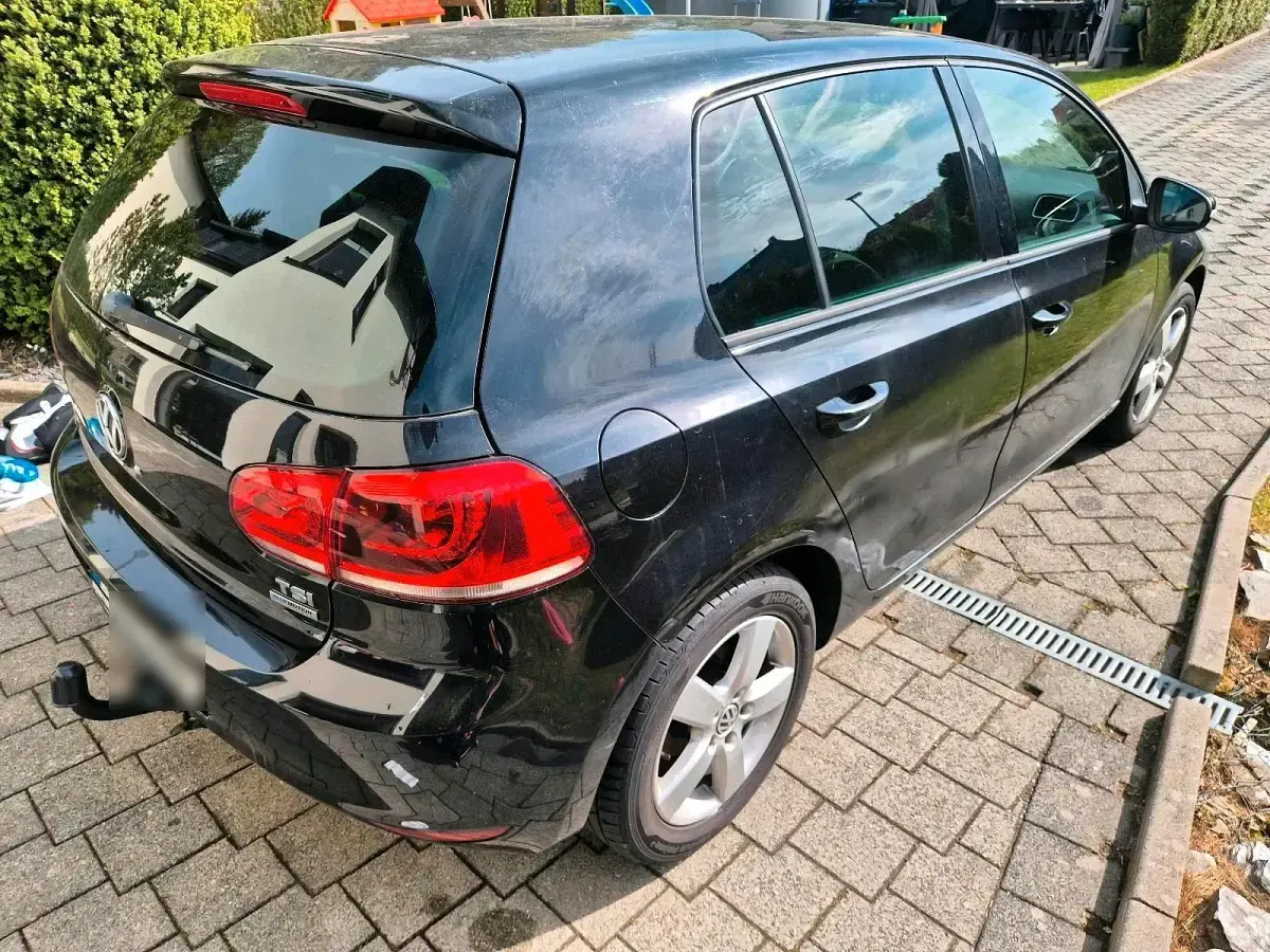 Gebraucht VW Golf VI Team 105 PS (77 kW) 2011 Schwarz Kleinwagen