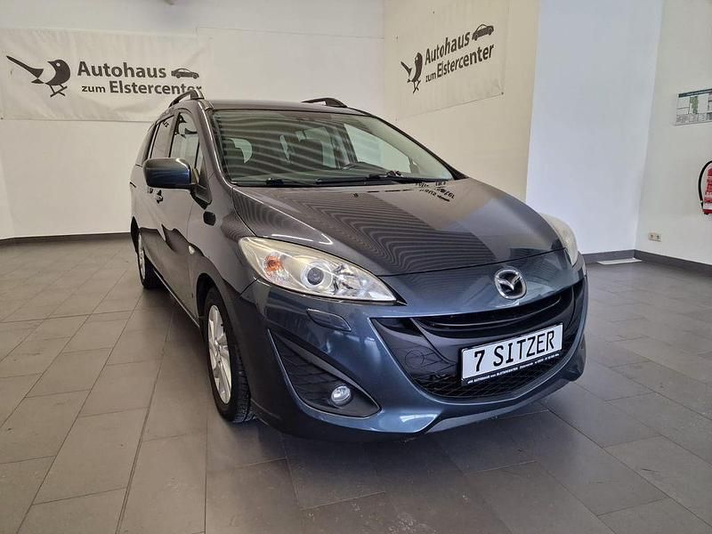 Grau Gebraucht 2011 Mazda 5 Center-Line Van / Kleinbus | 6.990 € - Bild 1/4