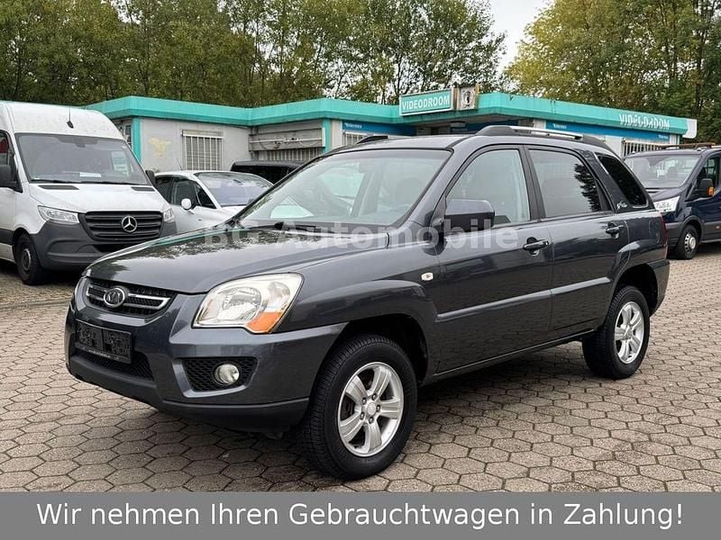 Grau Gebraucht 2010 Kia Sportage Attract SUV | 5.990 € (Fairer Preis) - Bild 1/4