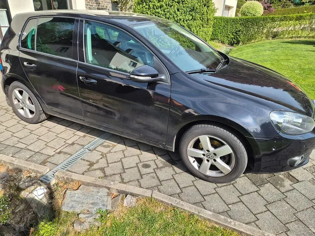 Gebraucht VW Golf VI Team 105 PS (77 kW) 2011 Schwarz Kleinwagen