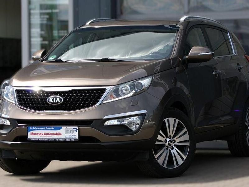 Braun metallic Gebraucht 2015 Kia Sportage Spirit SUV | 14.900 € (Fairer Preis) - Bild 1/4