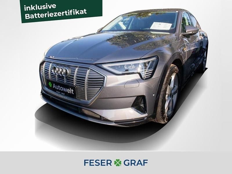 Grau Gebraucht 2022 Audi e-tron Sportback Advanced SUV | 30.888 € (Guter Preis) - Bild 1/4