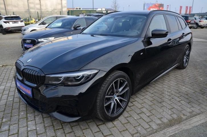 Schwarz Gebraucht 2021 BMW 320 M Sport Kombi | 39.090 € - Bild 1/4