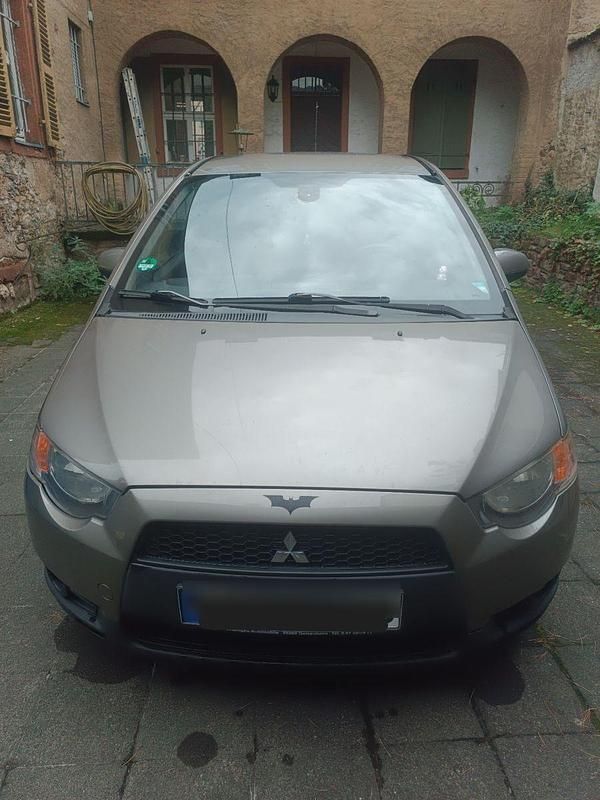 Grau Gebraucht 2010 Mitsubishi Colt Kleinwagen | 2.499 € (Fairer Preis) - Bild 1/4