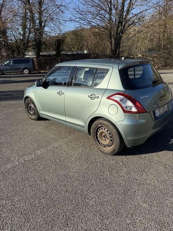 Gebraucht Suzuki Swift Comfort 97 PS (71 kW) 2012 Grün Limousine