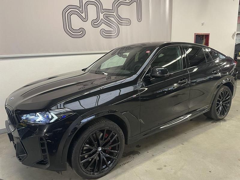 Black sapphire metallic Gebraucht 2024 BMW X6 M Sport SUV | 81.390 € (Superpreis) - Bild 1/4