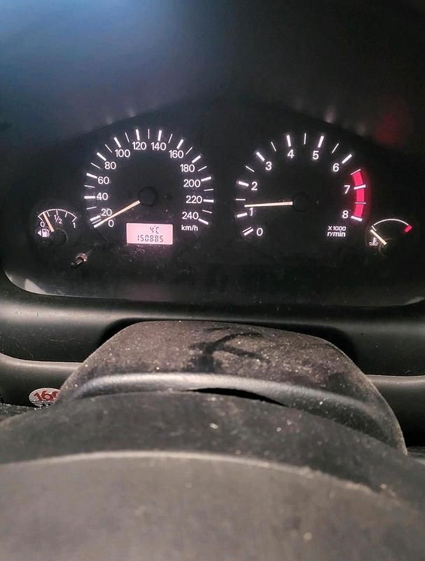 Gebraucht Mitsubishi Carisma 90 PS (66 kW) 1998 Grau Limousine