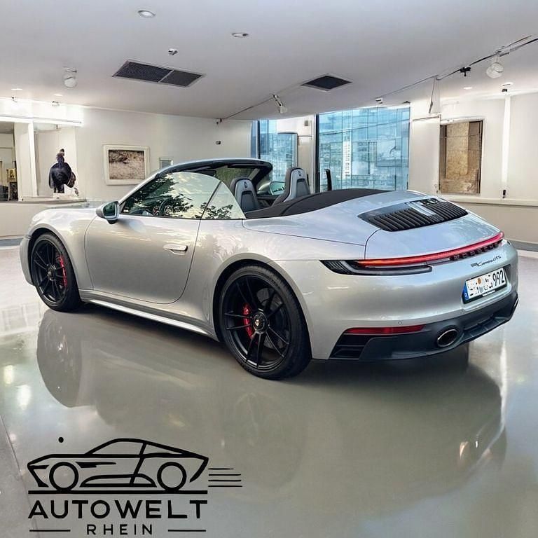 Gebraucht Porsche 992 480 PS (353 kW) 2022 Silber Cabrio