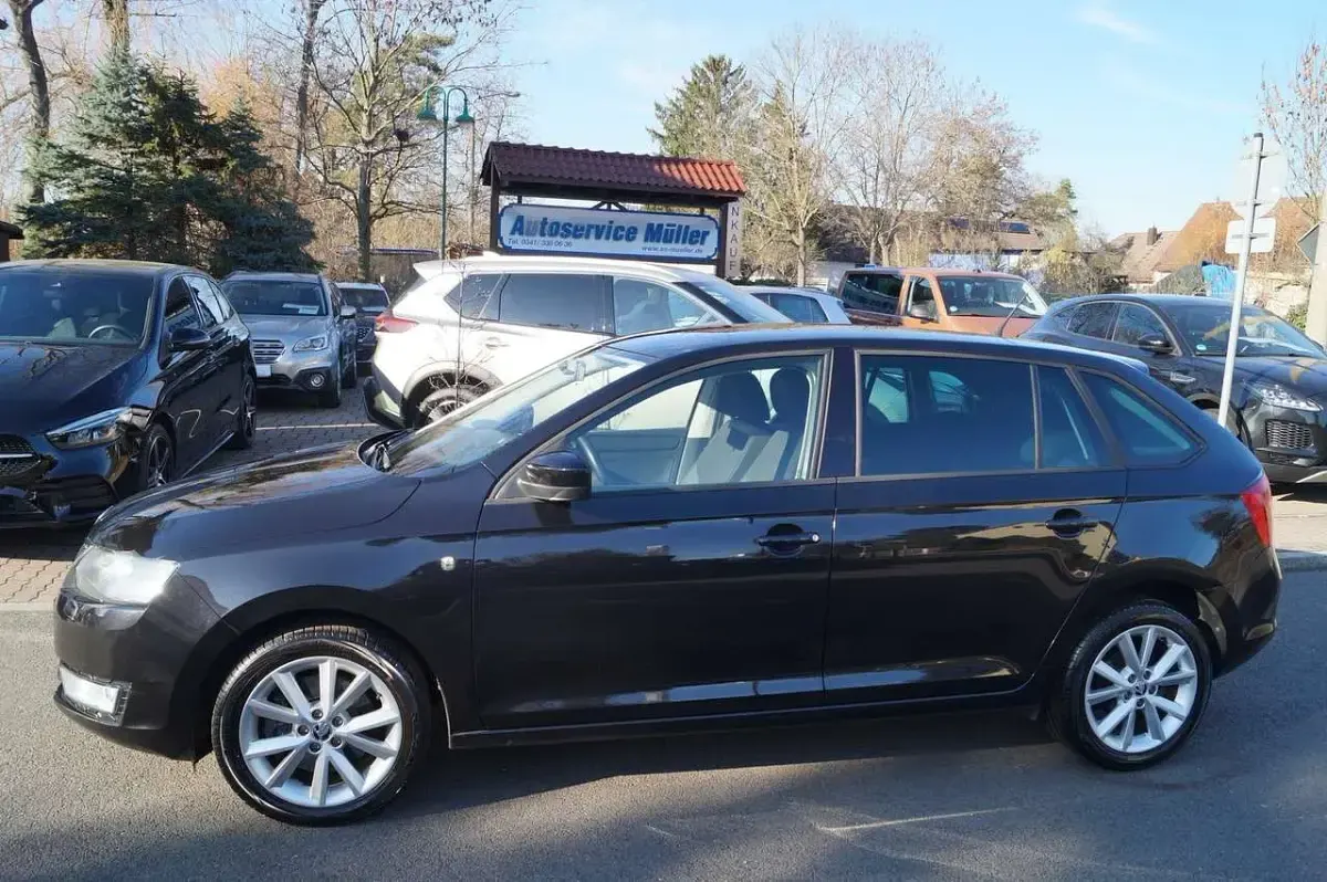 Second-hand Skoda Rapid 105 CP (77 kW) 2013 Negru Hatchback