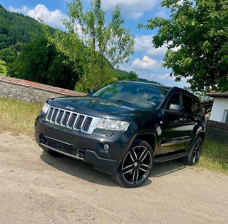 Grau Gebraucht 2011 Jeep Grand Cherokee Overland SUV | 16.000 € - Bild 1/4