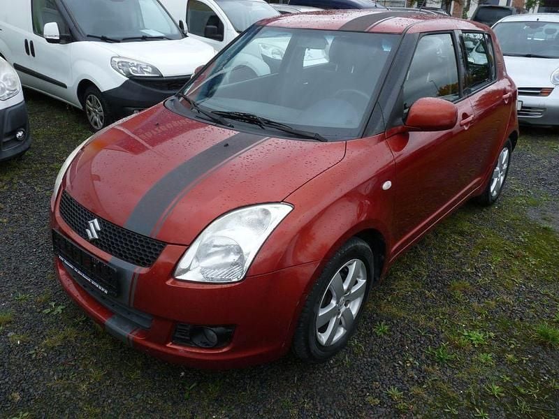 Orange Gebraucht 2010 Suzuki Swift Limousine | 2.900 € (Fairer Preis) - Bild 1/4