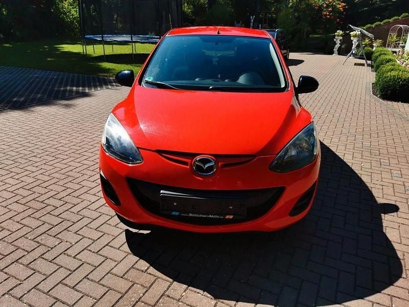 Second-hand Mazda 2 Inclusive 75 CP (55 kW) 2013 Roșu Hatchback