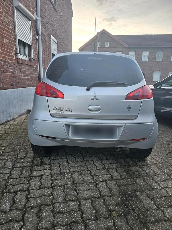 Second-hand Mitsubishi Colt 75 CP (55 kW) 2007 Argintiu Hatchback