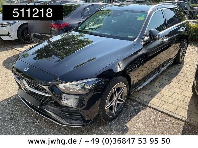 Obsidianschwarz (metallic) Gebraucht 2023 Mercedes C300e AMG Kombi | 37.450 € (Superpreis) - Bild 1/4
