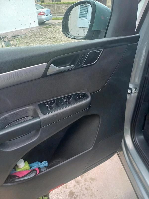 Second-hand VW Sharan 140 CP (102 kW) 2012 Albastru Monovolum