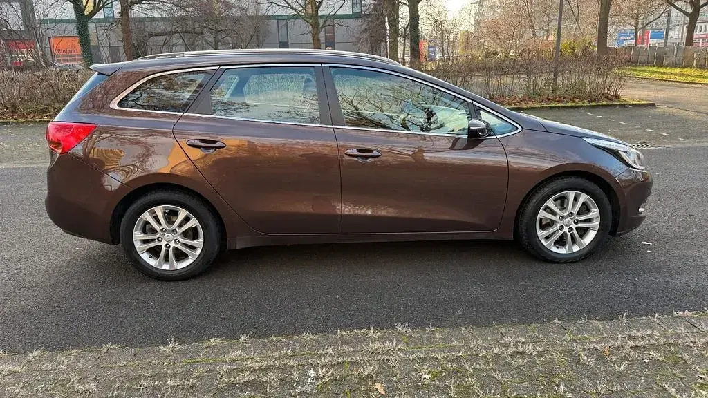 Gebraucht Kia Ceed Sportswagon Vision 128 PS (94 kW) 2014 Braun Kombi