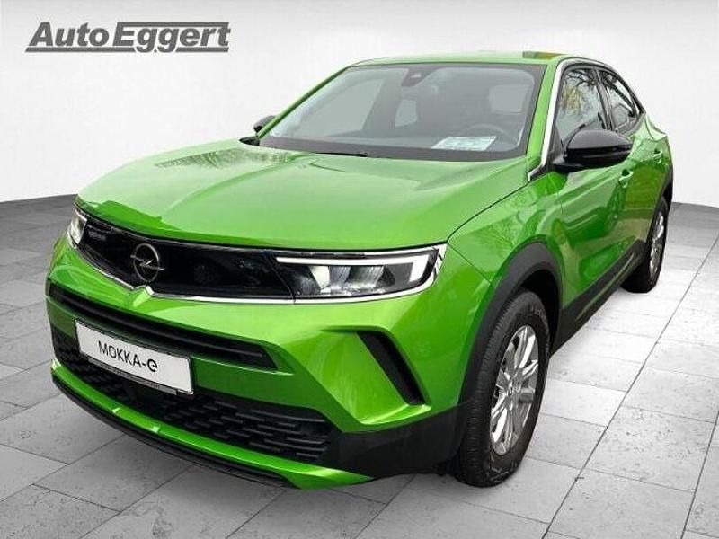 Gruen Gebraucht 2021 Opel Mokka-e Basis SUV | 22.740 € (Teuer) - Bild 1/3