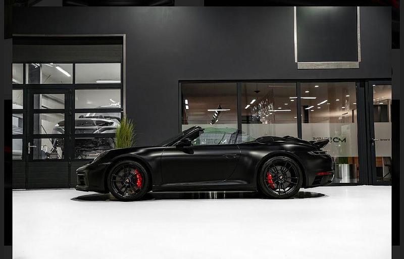 Gebraucht Porsche 911 480 PS (353 kW) 2023 Tiefschwarz Cabrio