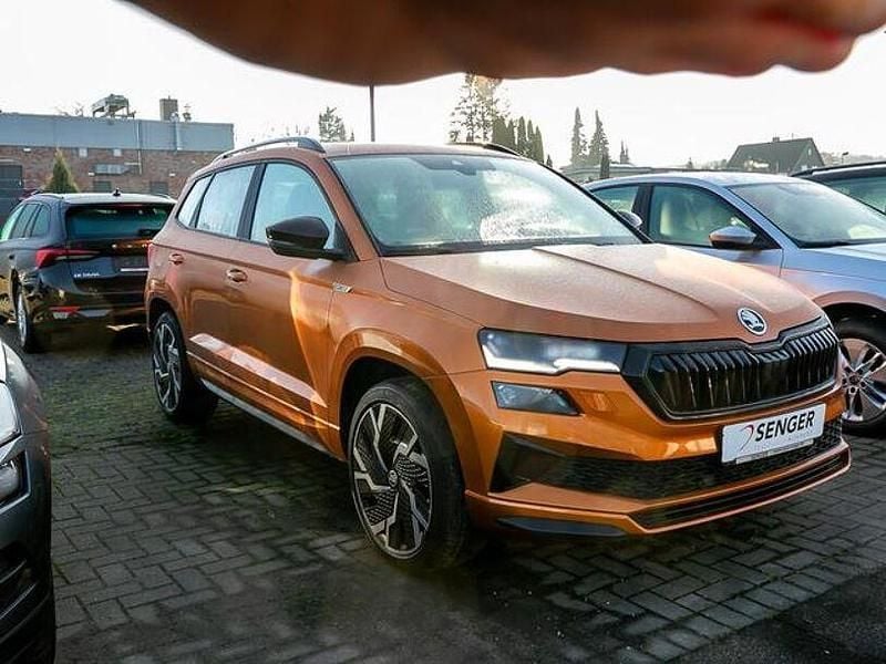 Gebraucht Skoda Karoq SportLine 190 PS (139 kW) 2022 Phoenixorange premium meta... SUV