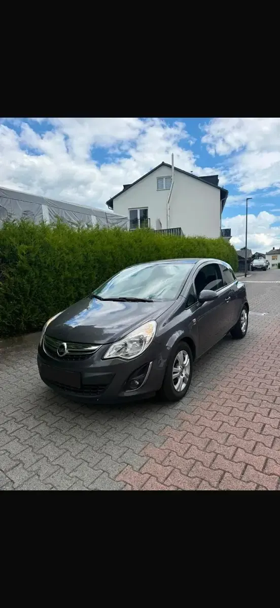 Gebraucht Opel Corsa 69 PS (50 kW) 2011 Grau Kleinwagen
