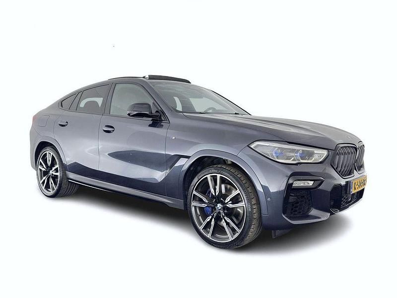 Grau Gebraucht 2019 BMW X6 M50 Executive SUV | 49.845 € - Bild 1/4