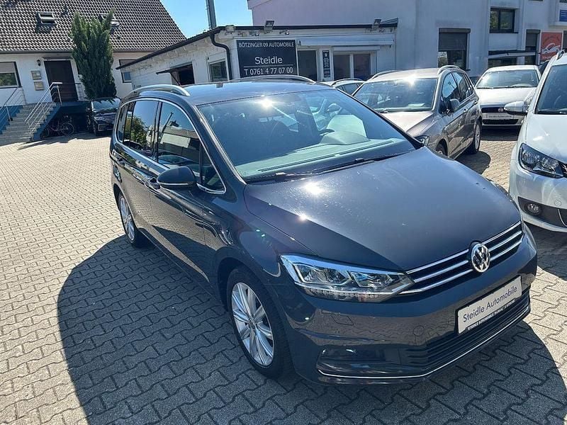 Uranograu Gebraucht 2017 VW Touran Highline Van / Kleinbus | 19.490 € (Fairer Preis) - Bild 1/4