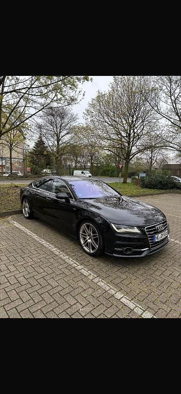 Schwarz Gebraucht 2013 Audi A7 Sportback Ambiente Kleinwagen | 22.000 € (Teuer) - Bild 1/4