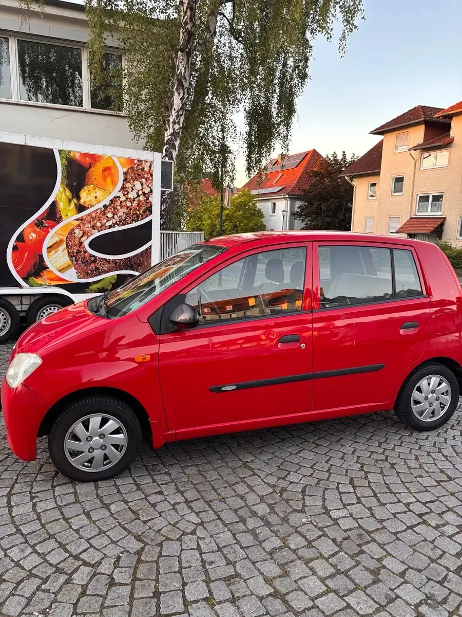 Gebraucht Daihatsu Charade 58 PS (42 kW) 2004 Rot Kleinwagen