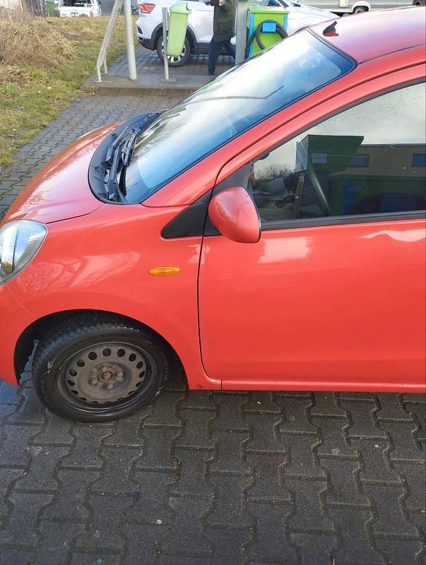 Gebraucht Daihatsu Cuore 65 PS (47 kW) 2008 Rot Kleinwagen