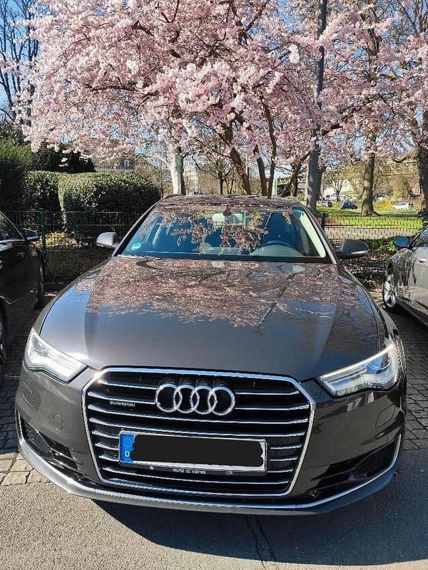 Second-hand Audi A6 Basis 218 CP (160 kW) 2015 Gri Break