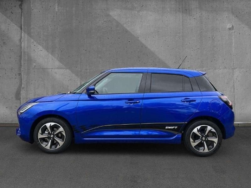 Blau Neu 2025 Suzuki Swift Comfort+ Limousine | 19.900 € - Bild 1/3
