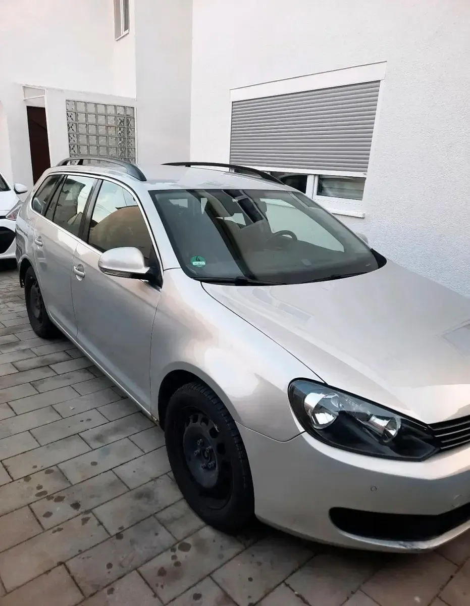 Second-hand VW Golf VI 105 CP (77 kW) 2010 Argintiu Hatchback