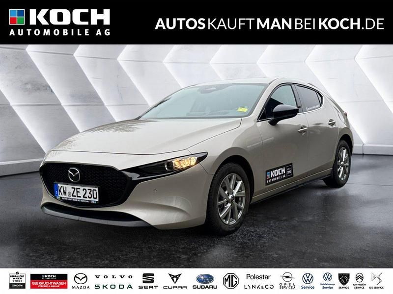 Grau (platinum quartz m) Gebraucht 2024 Mazda 3 Homura-Line Limousine | 23.300 € (Guter Preis) - Bild 1/4