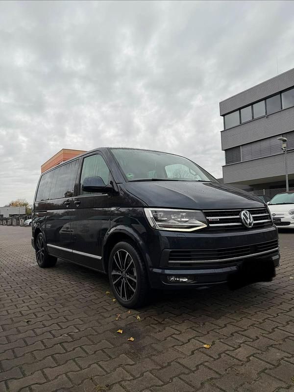 Grau Gebraucht 2016 VW Multivan Highline Van | 20.500 € (Superpreis) - Bild 1/4