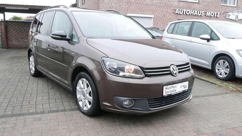 Braun Gebraucht 2013 VW Touran Match Van / Kleinbus | 5.990 € (Fairer Preis) - Bild 1/4