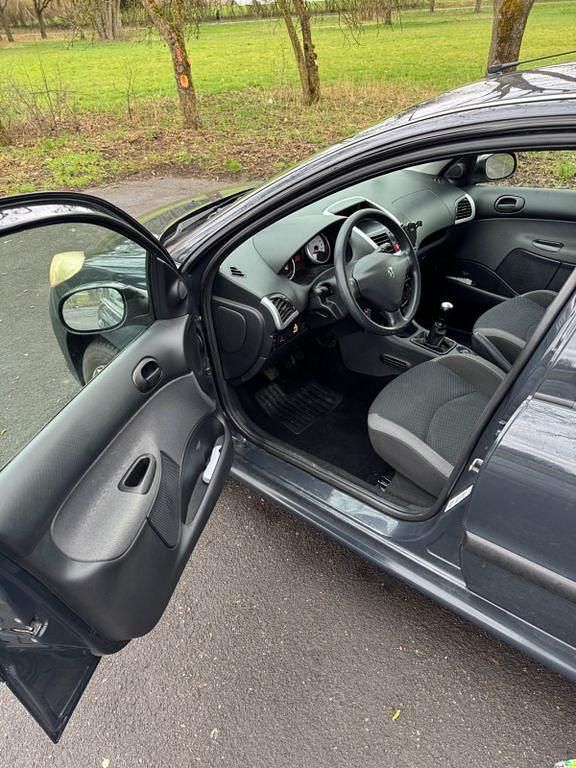 Gebraucht Peugeot 206+ 75 PS (55 kW) 2010 Schwarz Kleinwagen