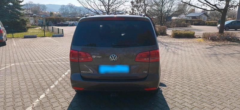 Gebraucht VW Touran 105 PS (77 kW) 2012 Braun Van / Kleinbus