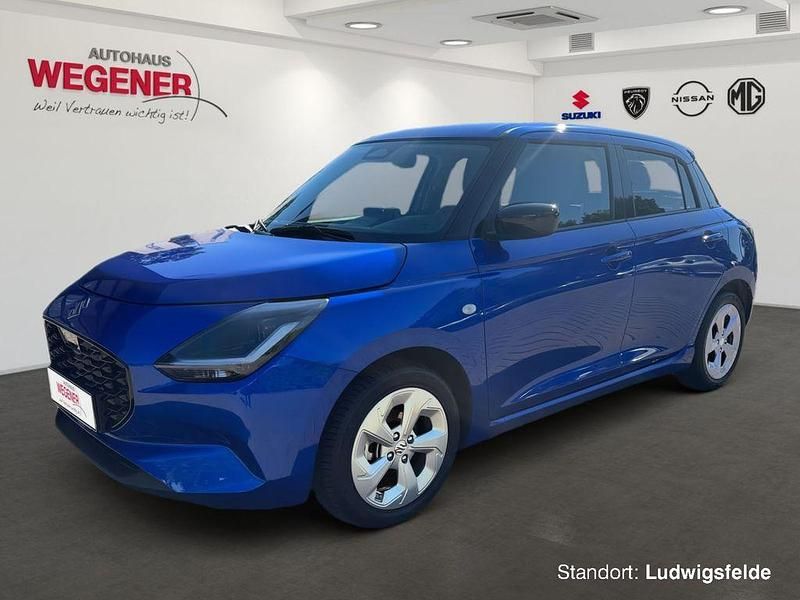Frontier blue pearl Gebraucht 2024 Suzuki Swift Comfort Kleinwagen | 18.895 € (Fairer Preis) - Bild 1/4