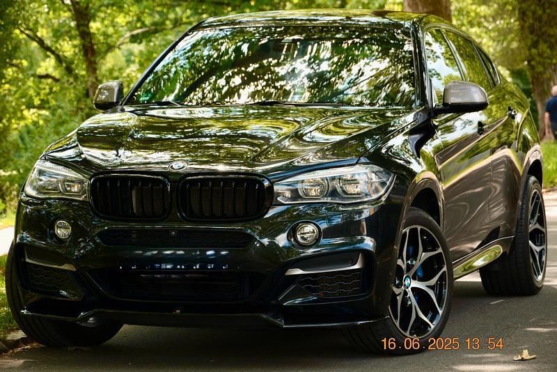 Schwarz Gebraucht 2015 BMW X6 M50 SUV | 33.500 € (Fairer Preis) - Bild 1/4