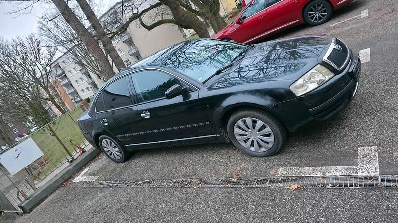 Second-hand Skoda Superb 140 CP (102 kW) 2005 Negru Berlinǎ